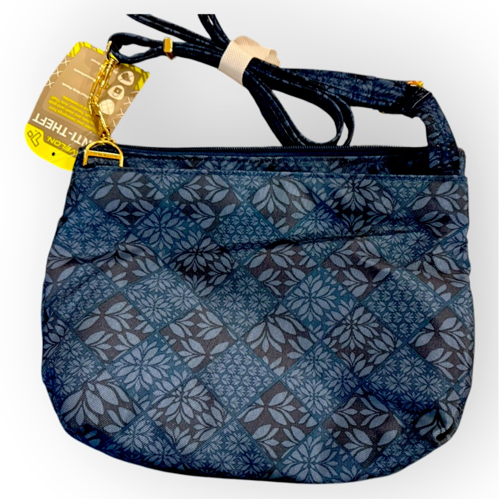 Travelon Blue Floral Quilted Crossbody Bag / used like new , no tags